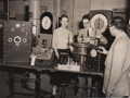 Anne Natvig in the Strength of Materials Laboratory, 1954-55<br/>As more men went overseas during World War II and the Korean War, more women came to the University of Michigan where they became a significant force in science and engineering.