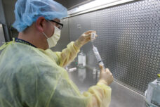 A pharmacist prepares medications at the U-M Health System pharmacy.