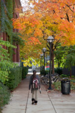 A student walks between the U-M Museum of Art and Tappan Hall on the way to her next class.