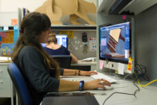 A student works on a design of a gavel in the Graphic Design Department at Michigan Union.