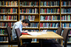 A graduate student gets some focused, quiet time in the Tanner Philosophy Library.